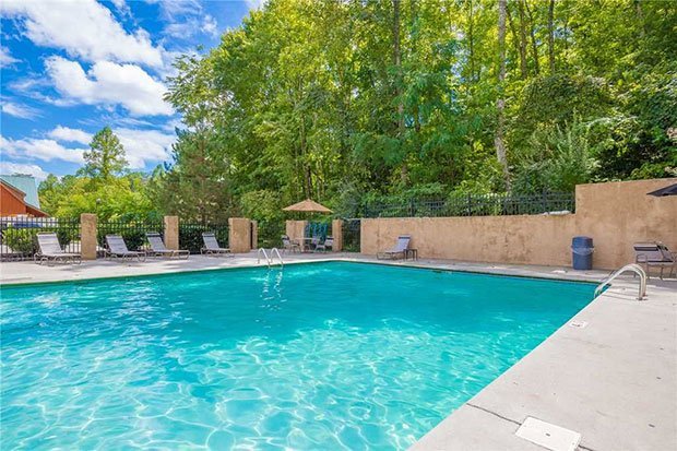 Log cabin swimming pool