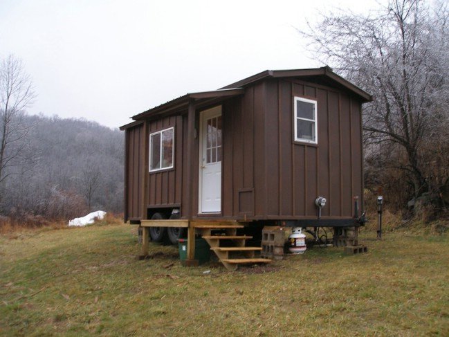 The Yahini Homes 8’ x 18’ Side Porch Cabin Is a Rustic Beauty