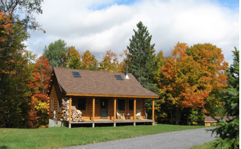 $55,250 Cozy Hickory Log Cabin Completes with Covered Porch