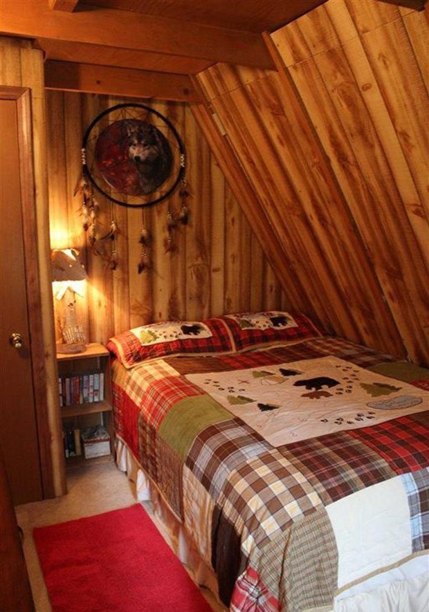 A frame cabin bedroom