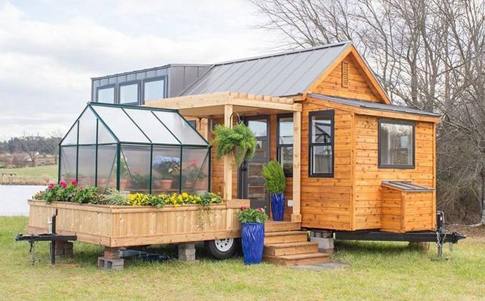 Two-part tiny house comes with its own mobile porch & greenhouse