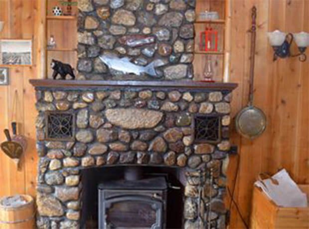 Lakeside log cabin fireplace