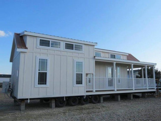 399 Square Foot Tiny House Complete with a White Picket Fence