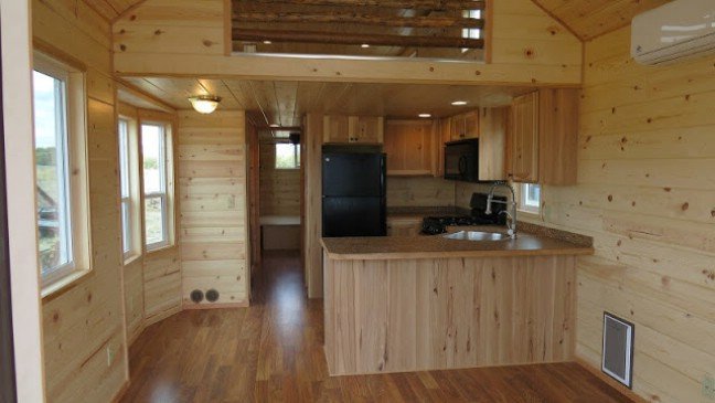 Spread Out in the Double Lofted Tiny House by Rich’s Portable Cabins