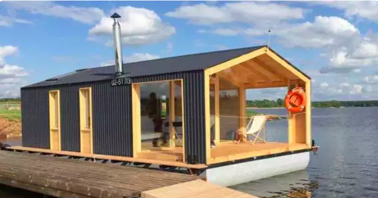 Could You Live In A Houseboat? This Floating Cabin May Tempt You