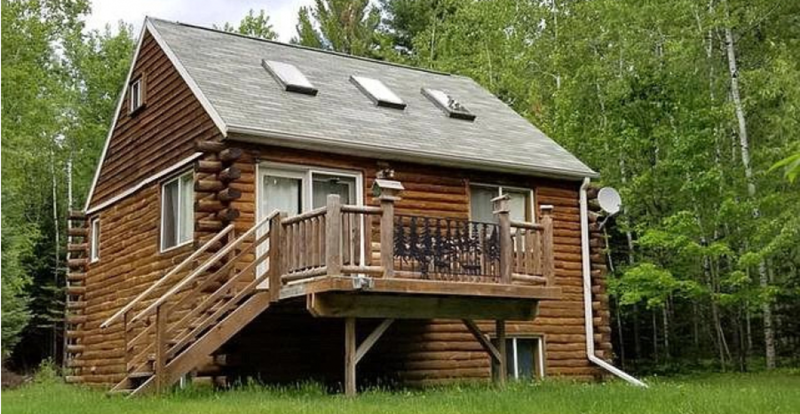 Log Cabin On 20 Acres In Wisconsin For $157K – Two Car Detached Garage!